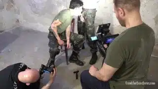 Behind the Scenes video, two military German young studs have bareback sex in a bunker