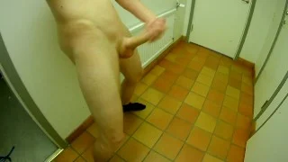 Unlocked door in public toilet. Sneaking around completely naked jerk off.