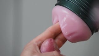 Extreme close up of cock in slow motion with Fleshlight and finished by cumshot